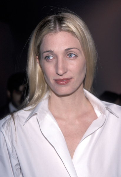 Carolyn BessetteKennedy wearing a white buttondown shirt