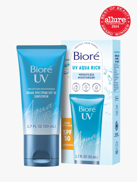 sunscreen in branded blue tube next to branded box packaging on light gray background&nbsp;with red and white 2024 allure best of beauty seal